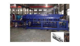 Horizontal drum pass vibrating finishing machine